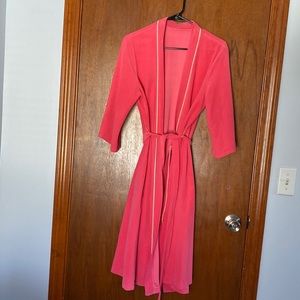Cute pink robe is light weight, fast drying and one front pocket,